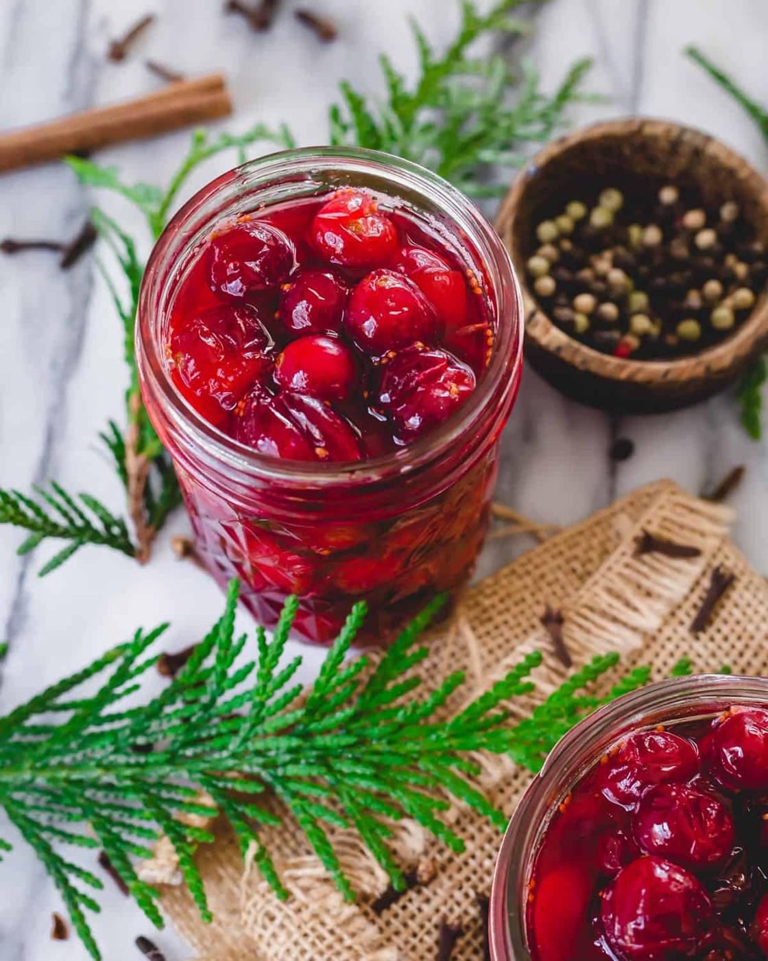 Canned pickled cranberries in jar.