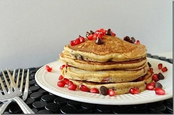 Festive pomegranate pancakes with chocolate chips make a great winter breakfast.