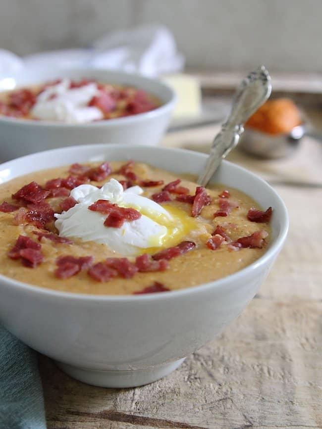 Pumpkin bacon grits with poached eggs