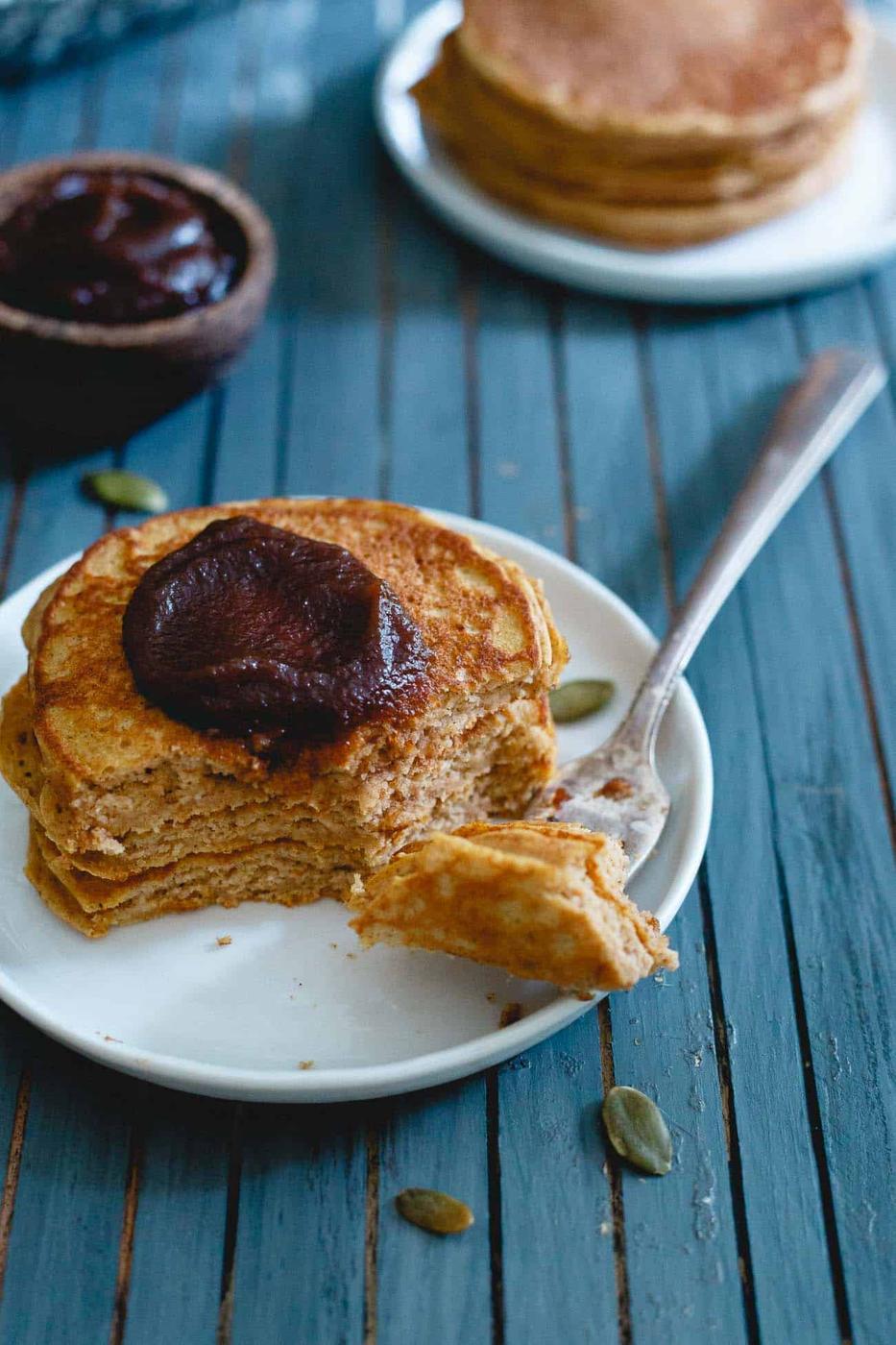 This fluffy, fall spiced stack of pumpkin protein pancakes is the perfect start to your morning.