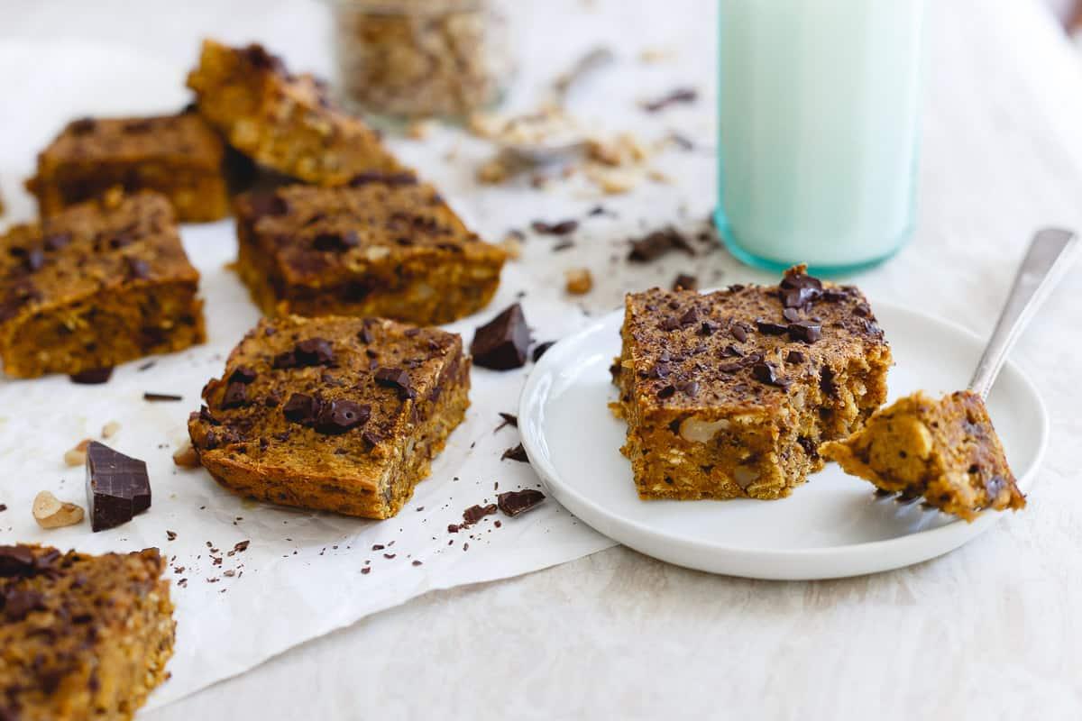 Packed with walnuts and dark chocolate, these pumpkin bars are a delicious fall treat.