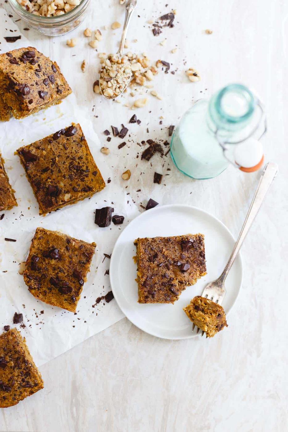 Chewy, walnut packed pumpkin chocolate chip bars are a great snack or healthy dessert.