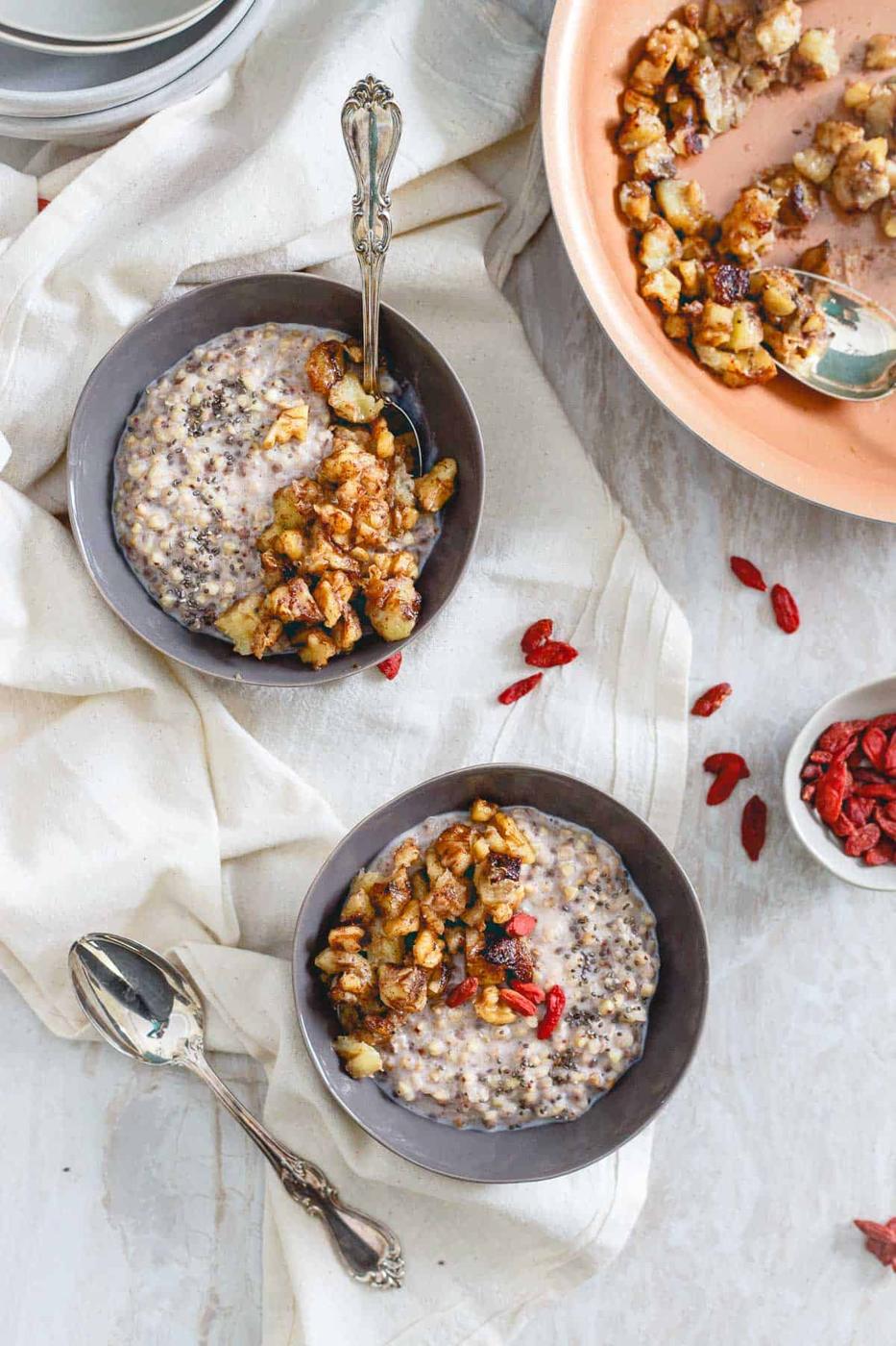 This warm breakfast cereal made with quinoa or buckwheat groats is topped with a sweet caramelized banana walnut topping.