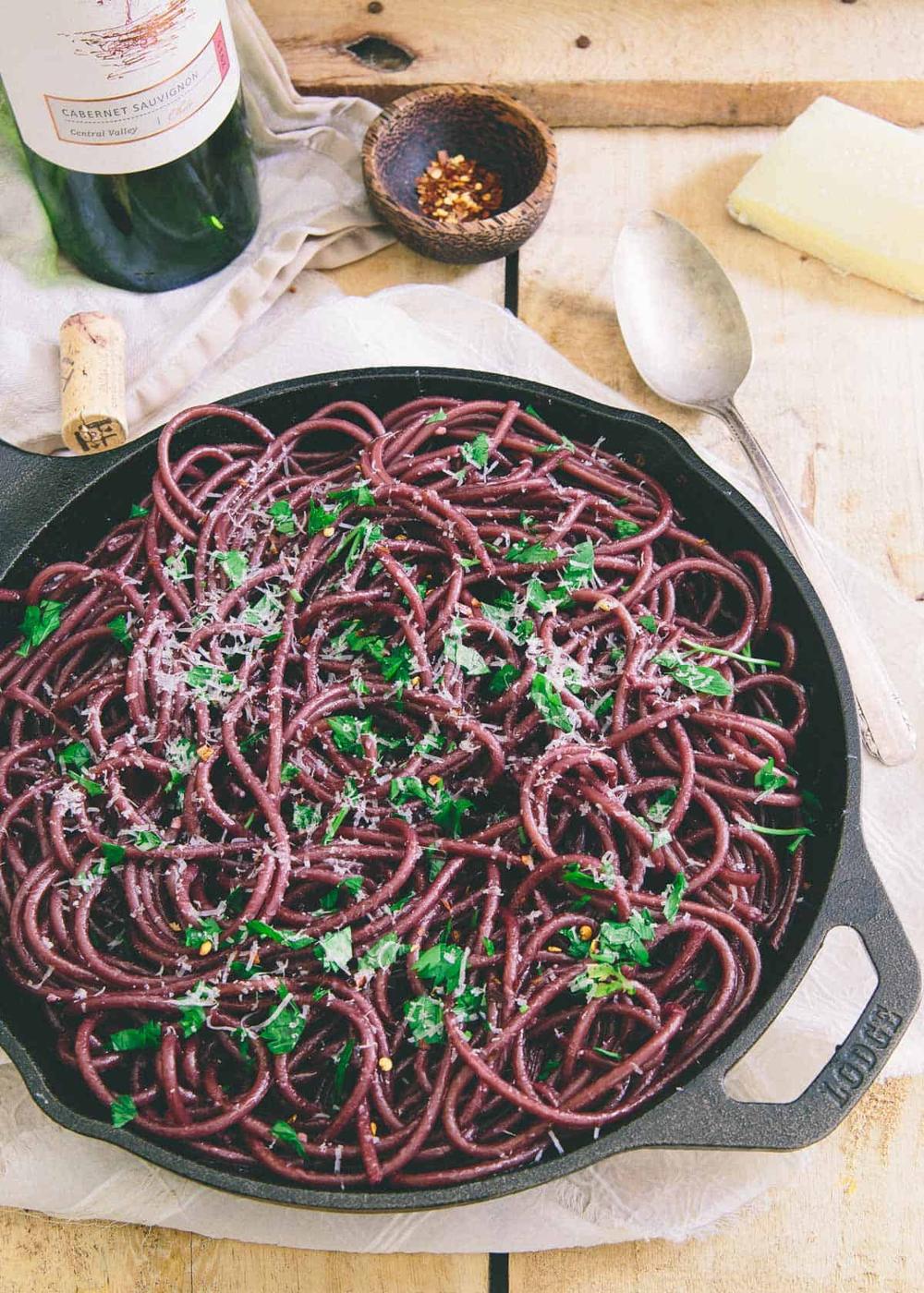 Red wine bucatini in a skillet.