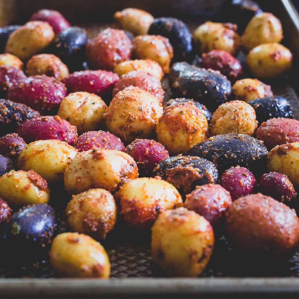 Roasted Portuguese potatoes on baking sheet.