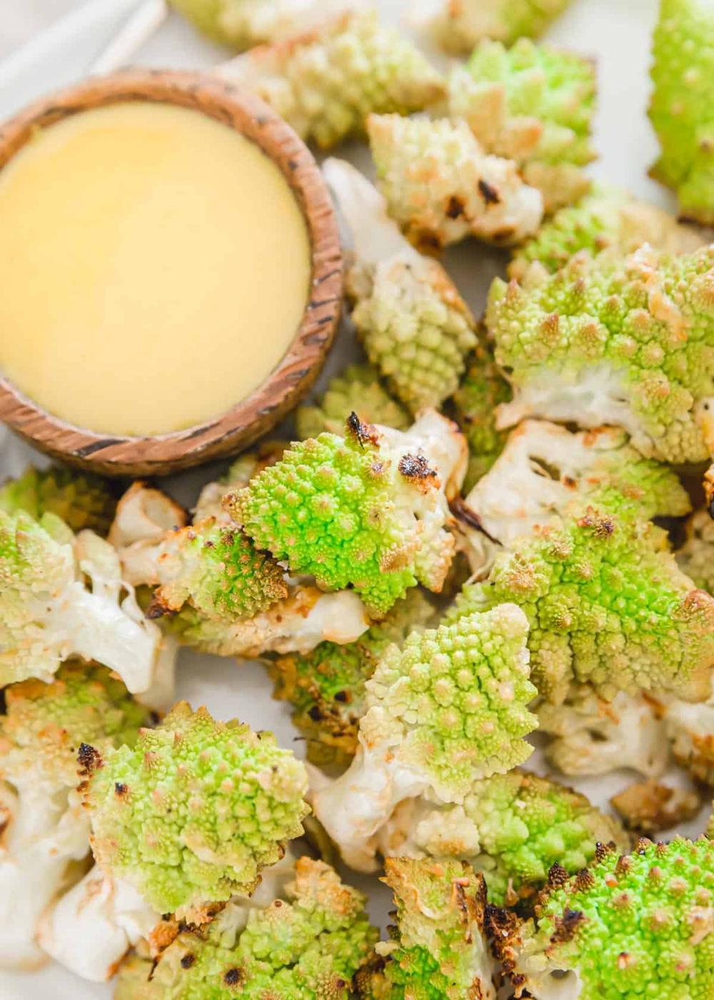 roasted romanesco served with turmeric tahini sauce