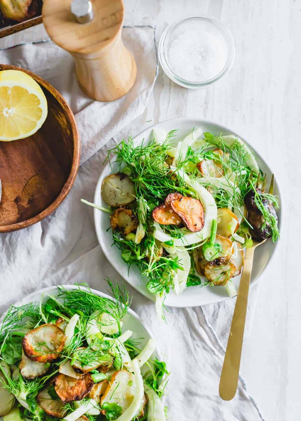 Roasted sunchoke salad with fennel and baby arugula tossed in a lemon dijon mustard dressing.