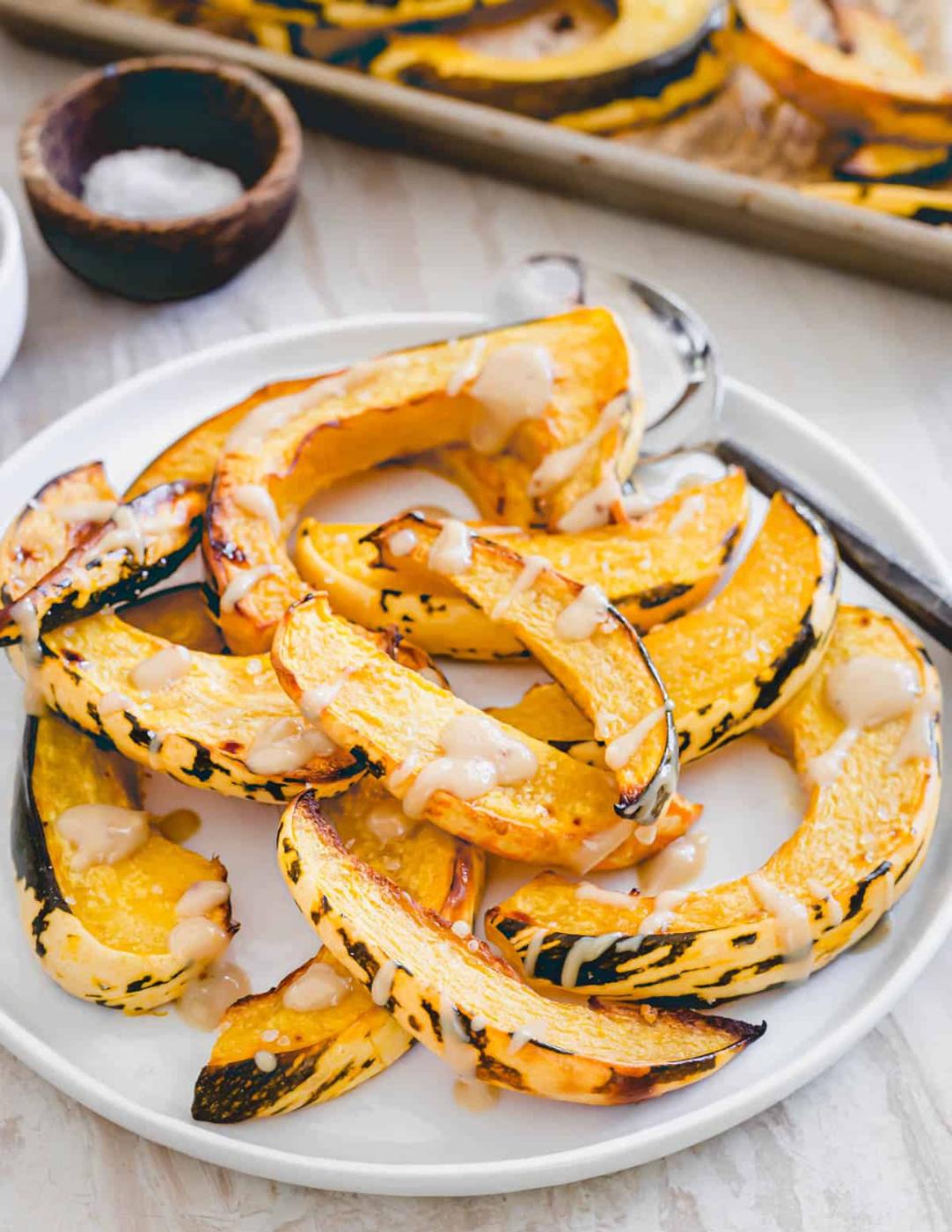 Roasted Sweet Dumpling Squash with Tahini Maple Dijon Sauce