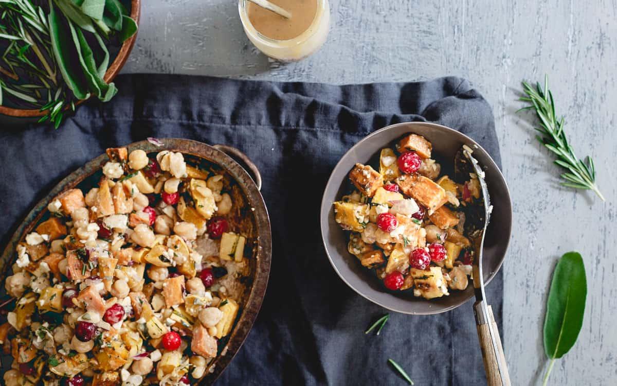 Celebrate fall in a hearty, vegetarian way with this roasted sweet potato, squash and chickpea salad.