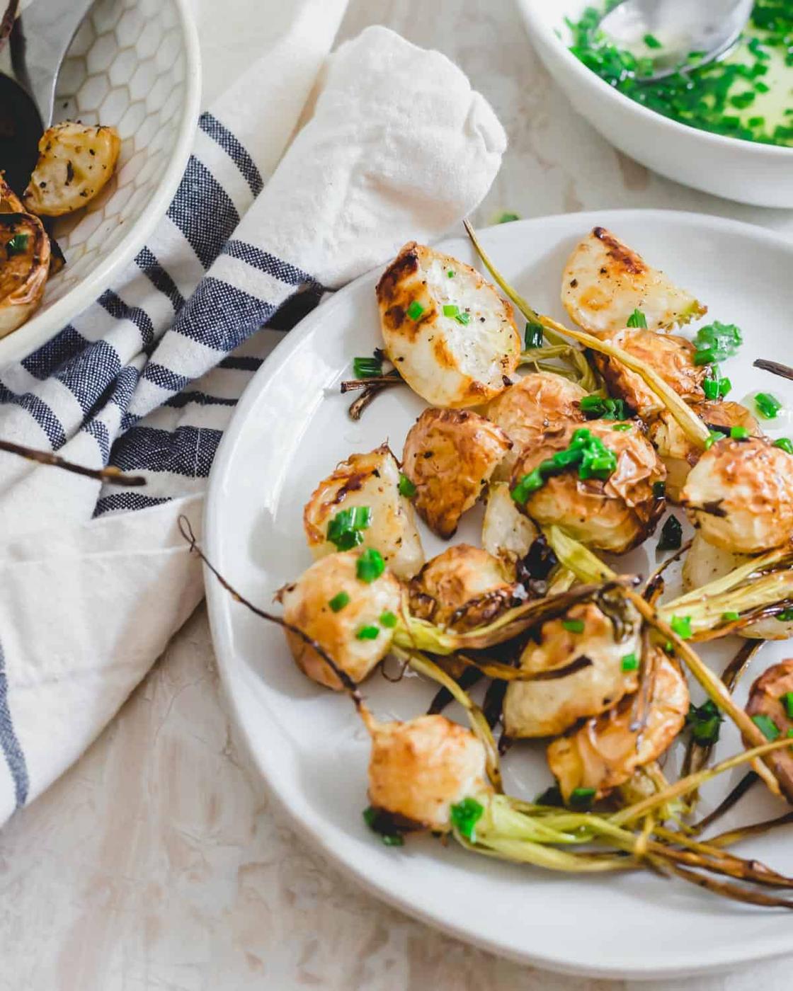 Simple and easy roasted turnip recipe with a chive butter sauce for serving.