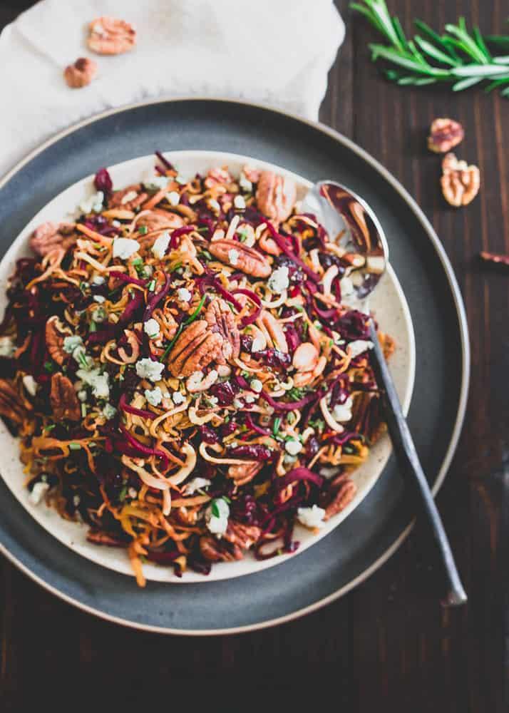 This roasted winter root vegetable salad makes a deliciously festive side dish to your holiday meal.