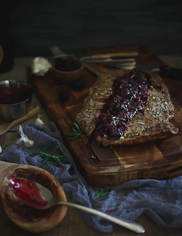 Rosemary Garlic Flank Steak with Tangy Blackberry Sauce