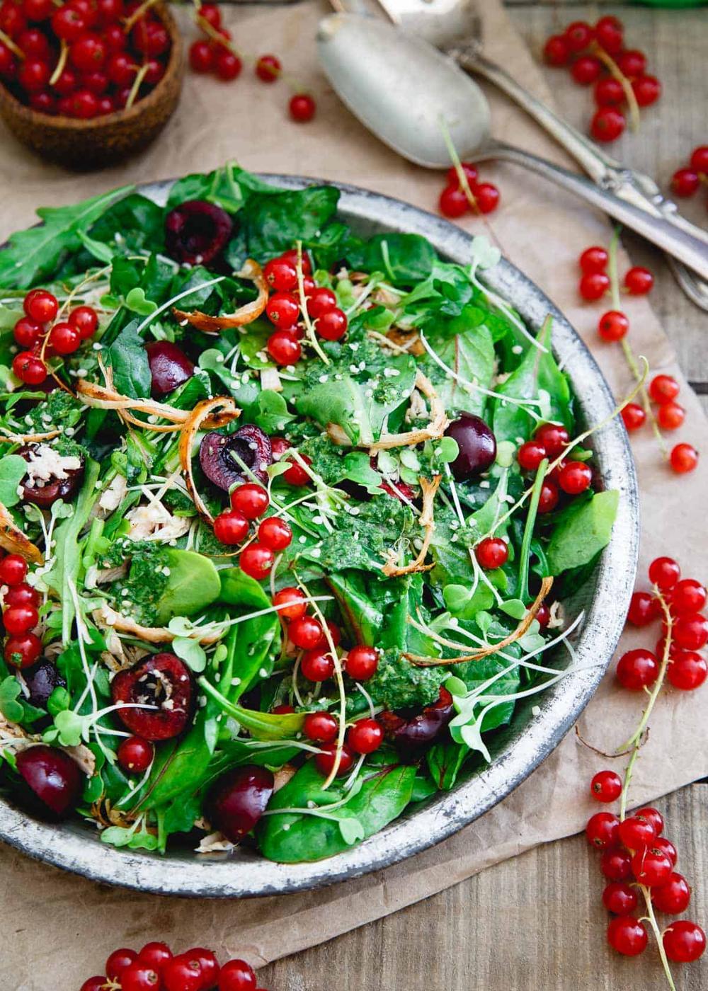 This Baby Kale Chicken Cherry Salad is bursting with summer flavor and tossed in a basil dijon dressing.