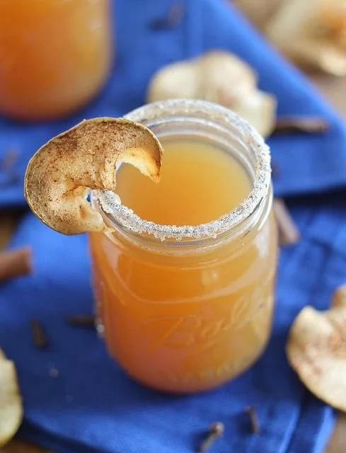 Spiked cider with oven baked apple crisps