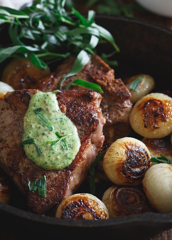 These American lamb loin chops are made stove top in the skillet with browned cipollini onions.