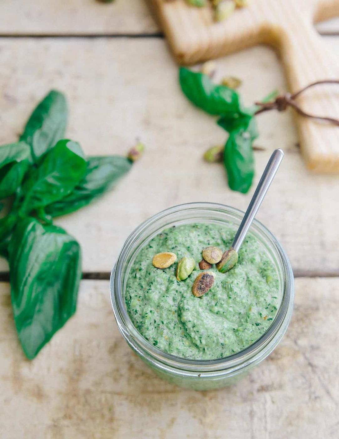 This tangy basil pesto is the base for this Skillet Zucchini Pesto Pizza and then drizzled on top for even more summer deliciousness!