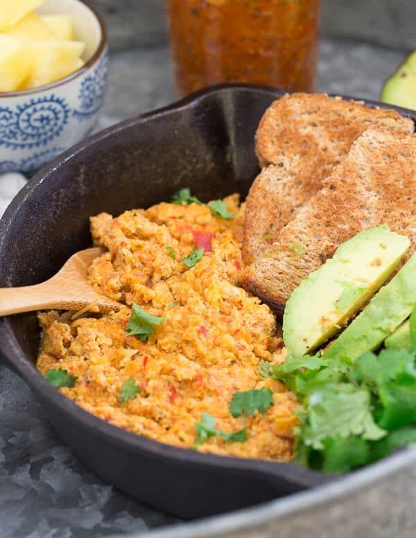 These eggs are scrambled with sofrito, a classic Spanish sauce cooked in oil that brings a ton of flavor and spice to this breakfast.