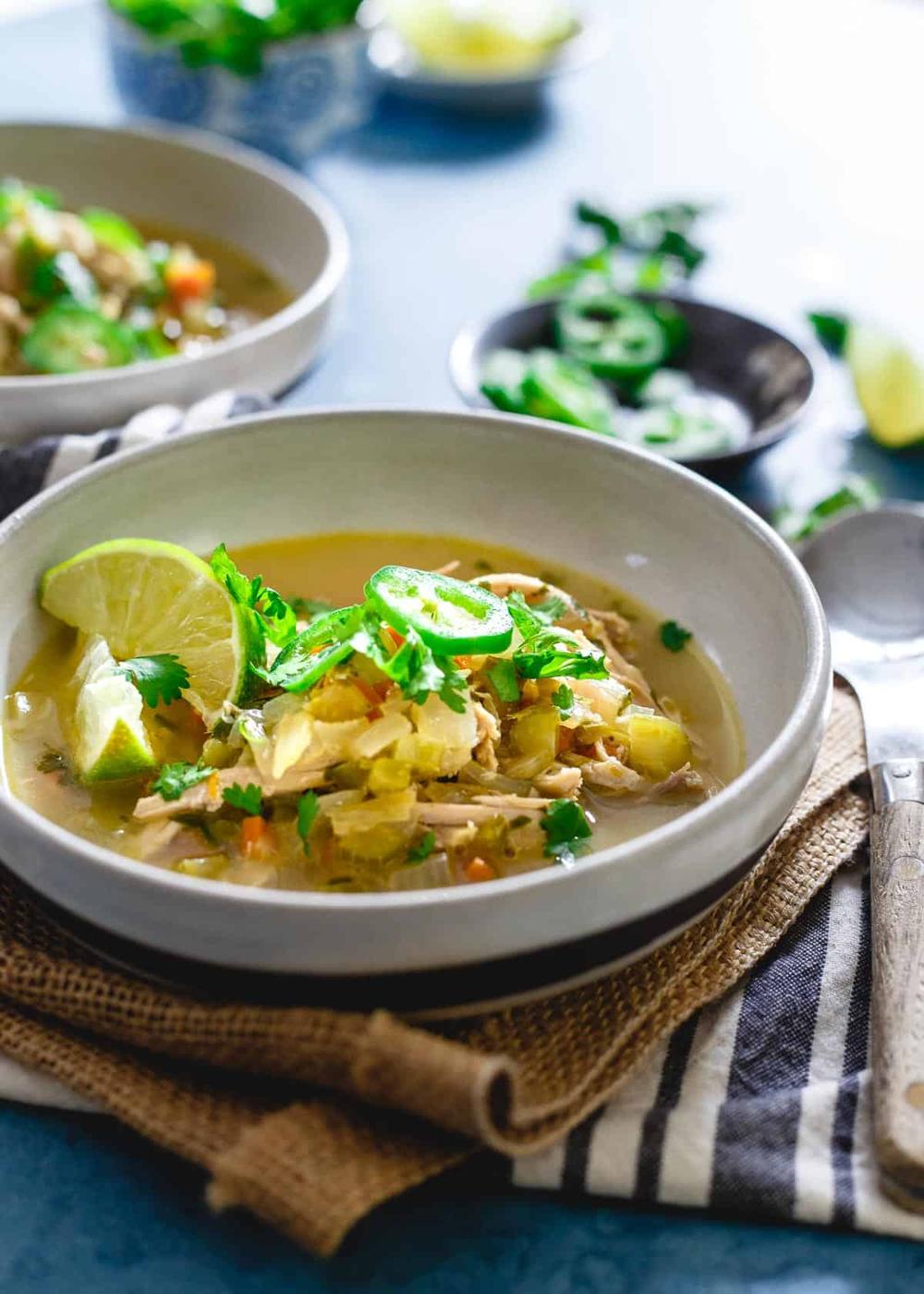 Spicy chicken lime soup is perfectly comforting for winter with a delicious tangy broth.