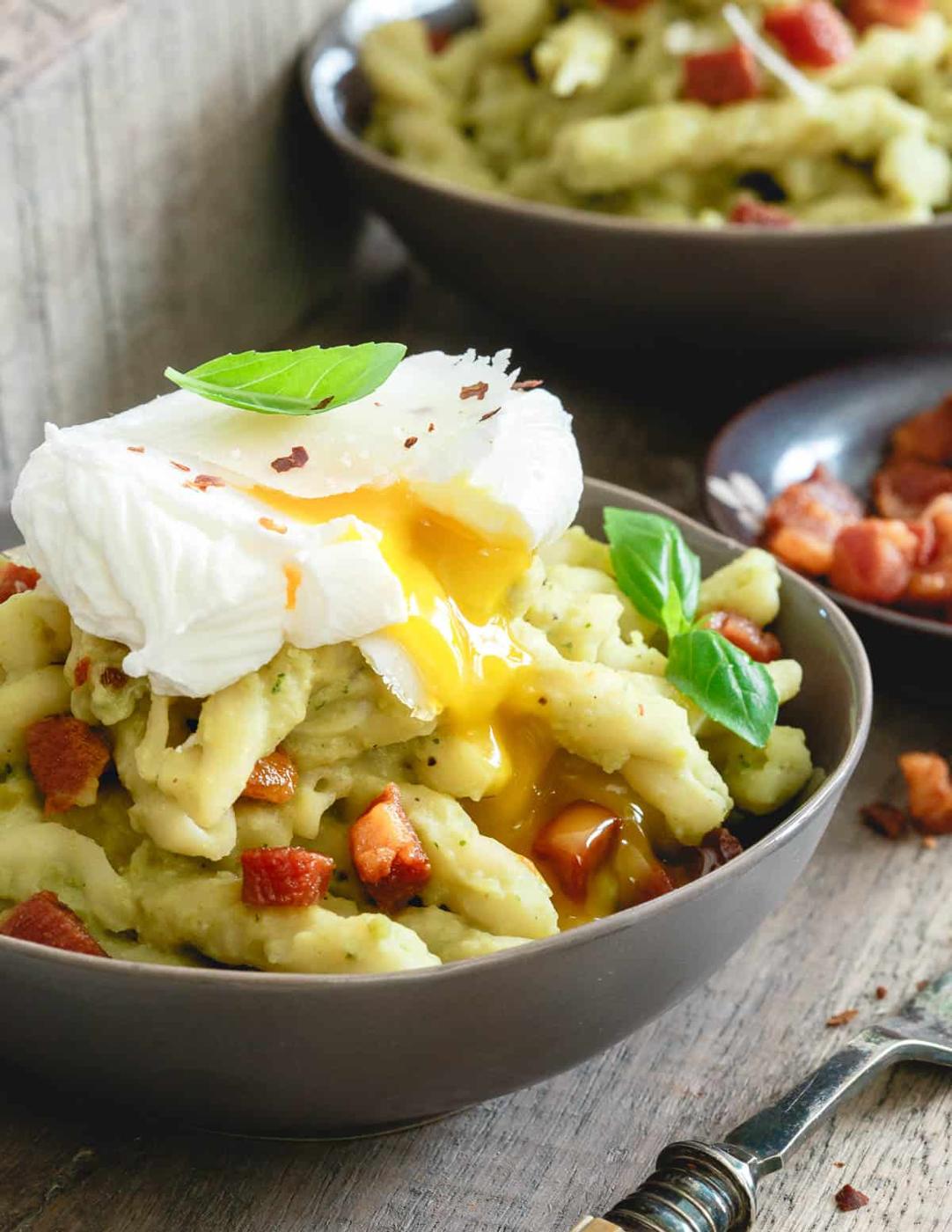 Crispy pancetta, a poached egg and creamy split pea pesto all tossed together with al dente gemelli pasta is pure comfort food.