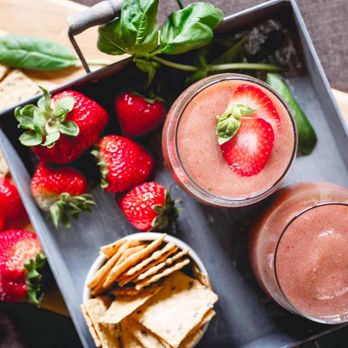 With just 3 ingredients, these strawberry basil cider slushies and some Crunchmaster crackers straight out of the bag make a great summer happy hour!