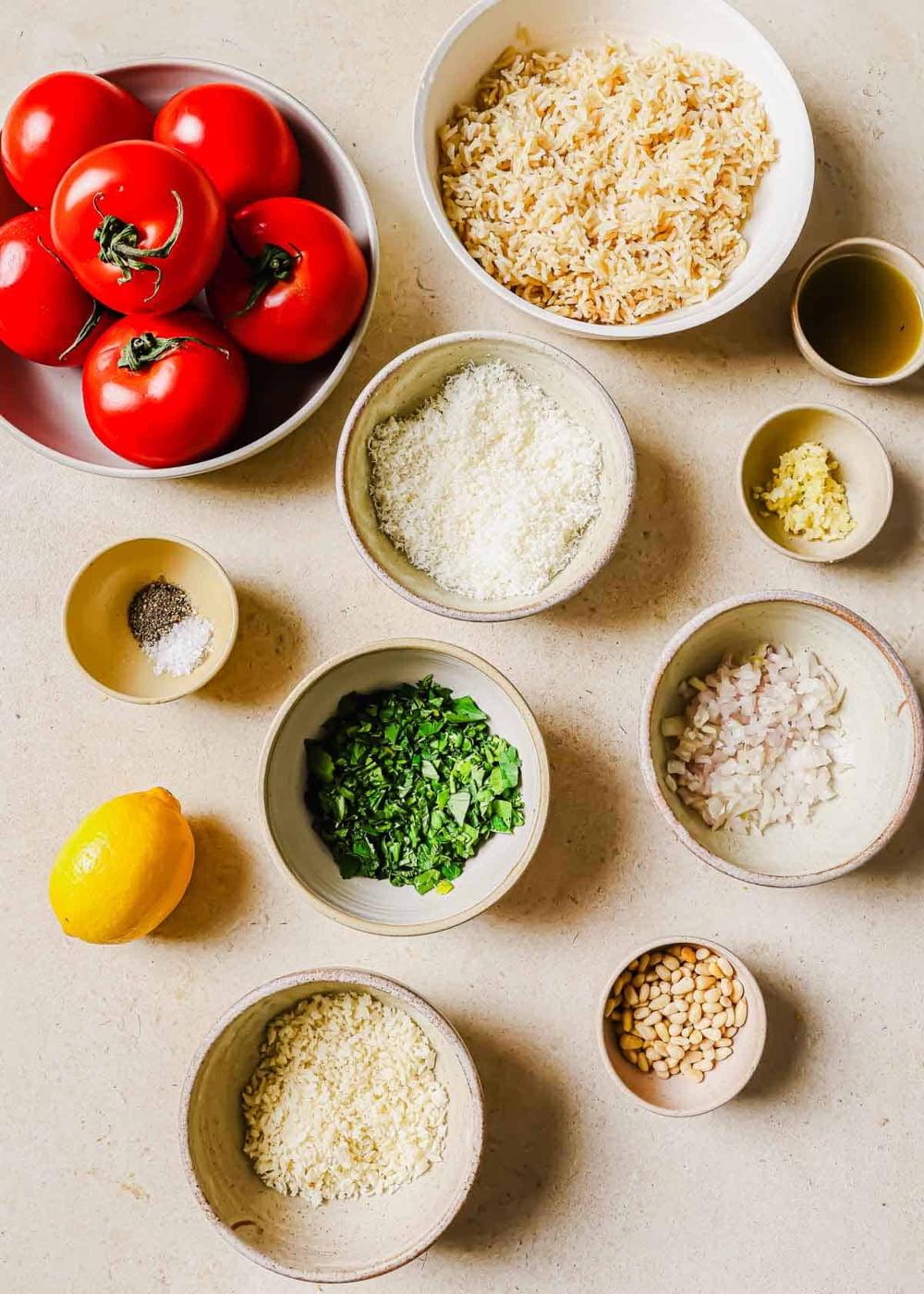 Ingredients in small bowls to make stuffed tomatoes.