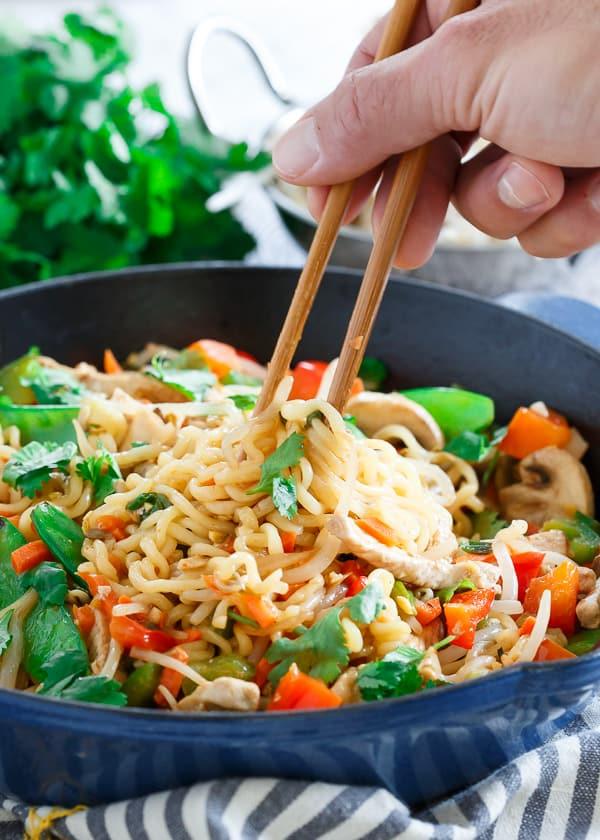 This 20 minute pork ramen stir fry is sweet, spicy and filled with vegetables for an easy, healthy dinner.