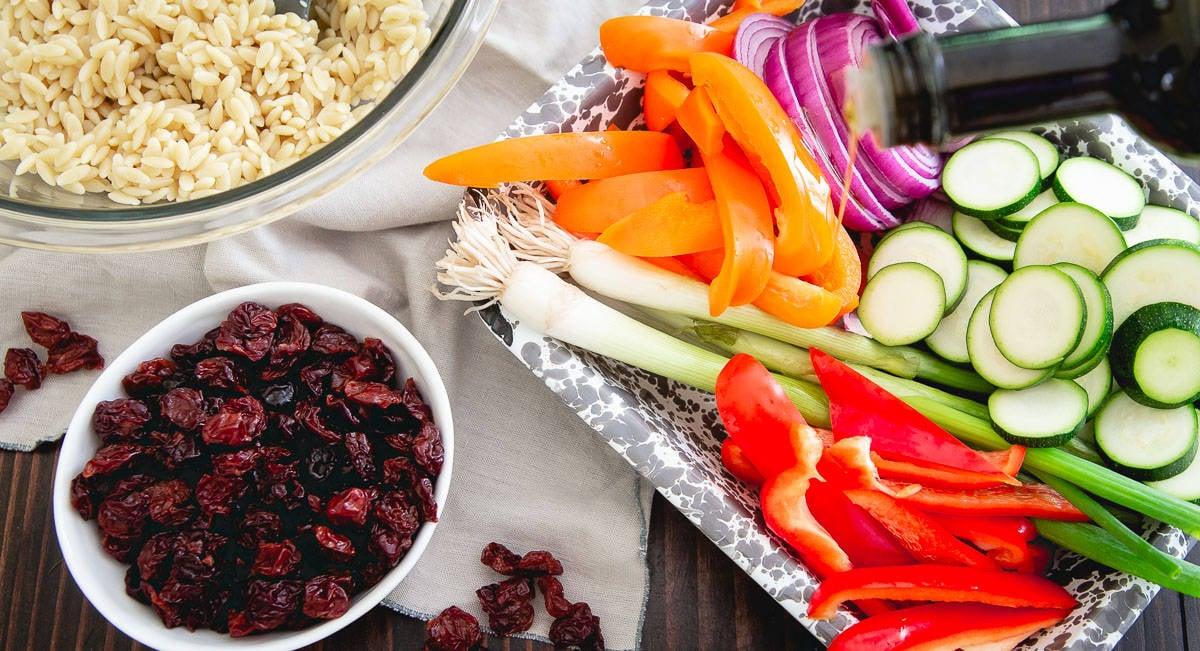 Summer vegetables are grilled with a delicious tart cherry balsamic glaze in this seasonal pasta salad.