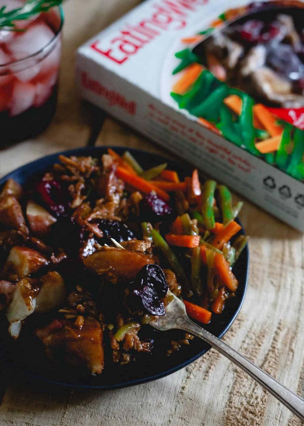 This cherry port pork dinner goes perfectly with a tart cherry red wine spritzer infused with rosemary.