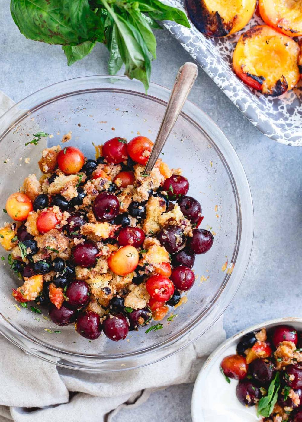 This summer fruit panzanella has toasted Udi's blueberry muffins in it for a sweet, simple summer treat.