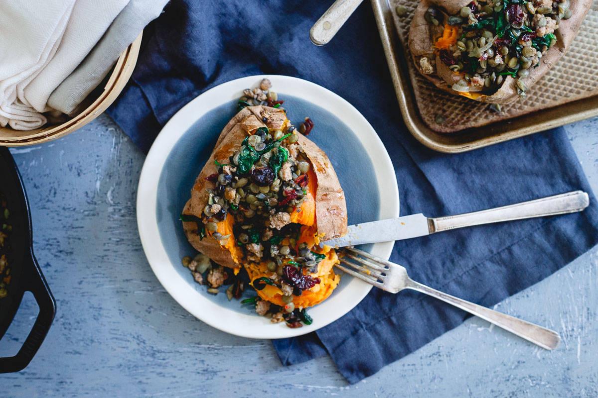 These turkey sausage stuffed sweet potatoes are packed with fall-inspired ingredients for a wholesome way to welcome in the new season.
