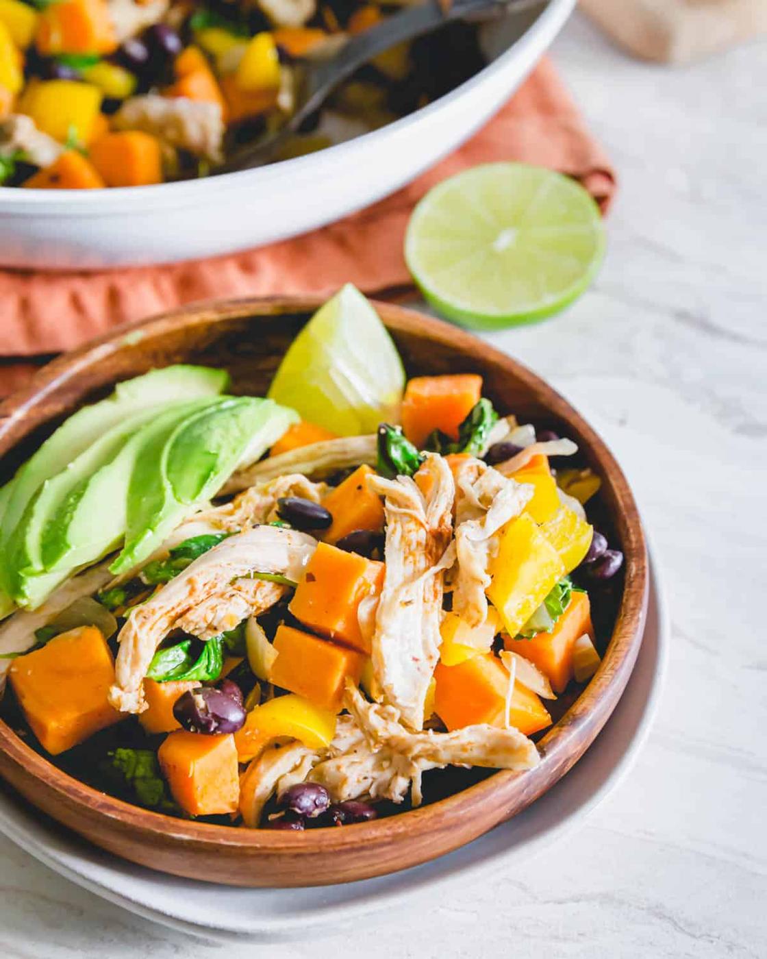 This easy turkey sweet potato skillet comes together in just about 20 minutes in one pan. Served with lime wedges and avocado slices.
