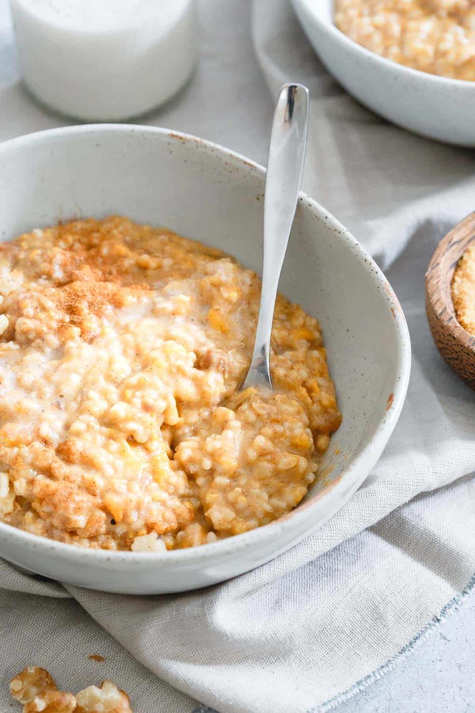 Sweet potato steel cut oatmeal in a bowl with a spoon.