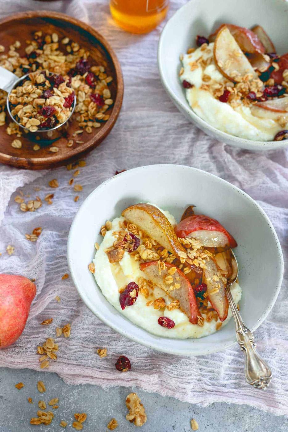 A seasonally delicious snack or breakfast, these whipped ricotta bowls are filled with cranberry granola and roasted pears.