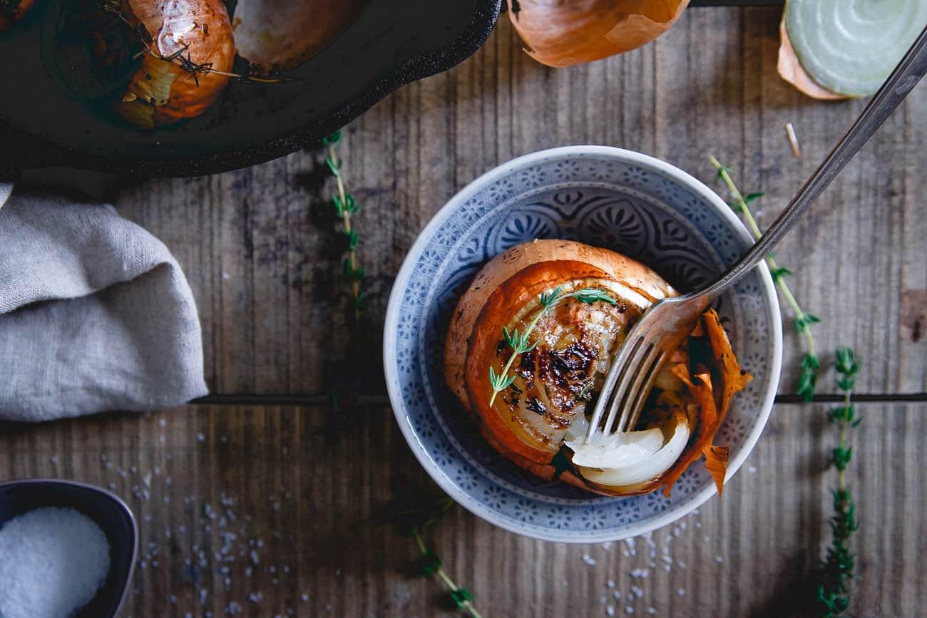 Balsamic and thyme gives these whole roasted onions a delicious deep flavor profile making them a great dinner side dish.