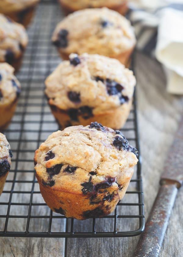 These blueberry ginger muffins are 100% whole wheat and made with wild blueberries and Greek yogurt for a healthy, superfood packed breakfast or snack.