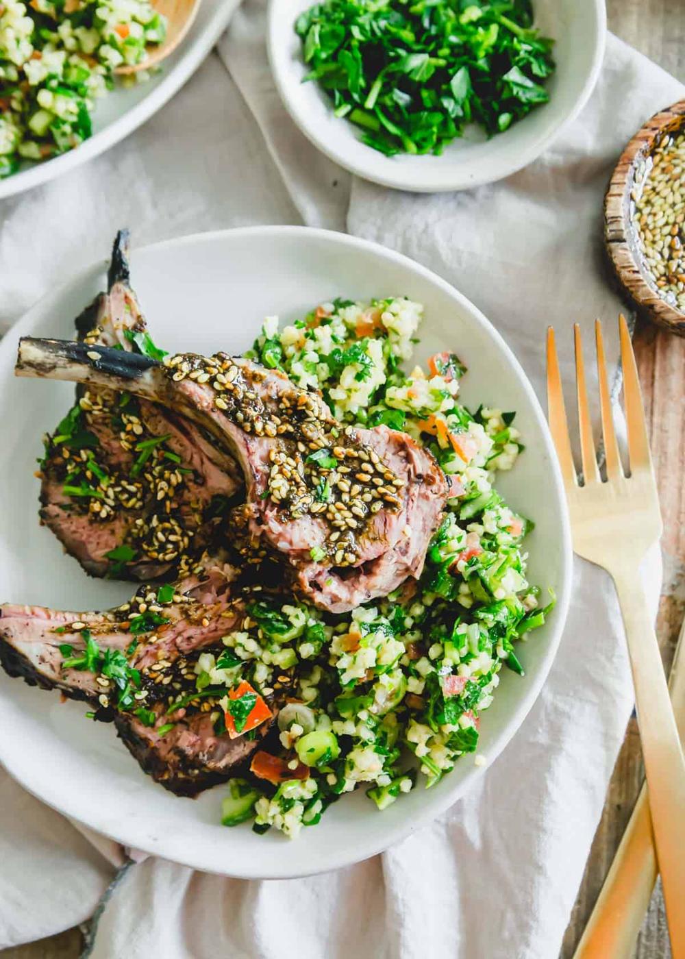 Za'atar seasoned grilled rack of lamb on a bed of gluten-free millet tabbouleh.