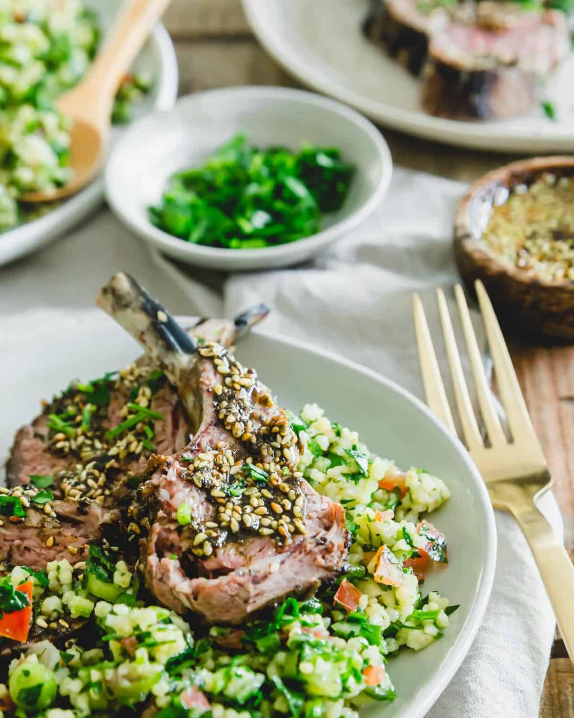 Grilled lamb chop with za'atar paste served with Mediterranean millet tabbouleh.