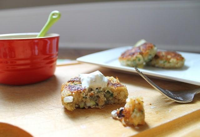 Zesty quinoa cakes with sour cream sauce.