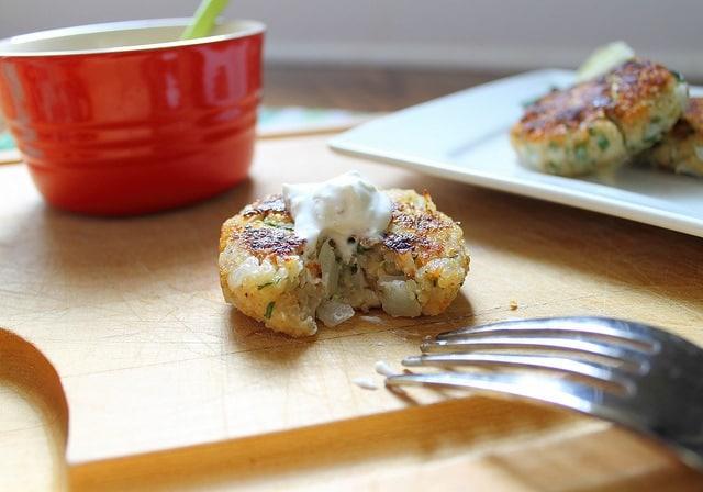 Quinoa cakes with sour cream topping.