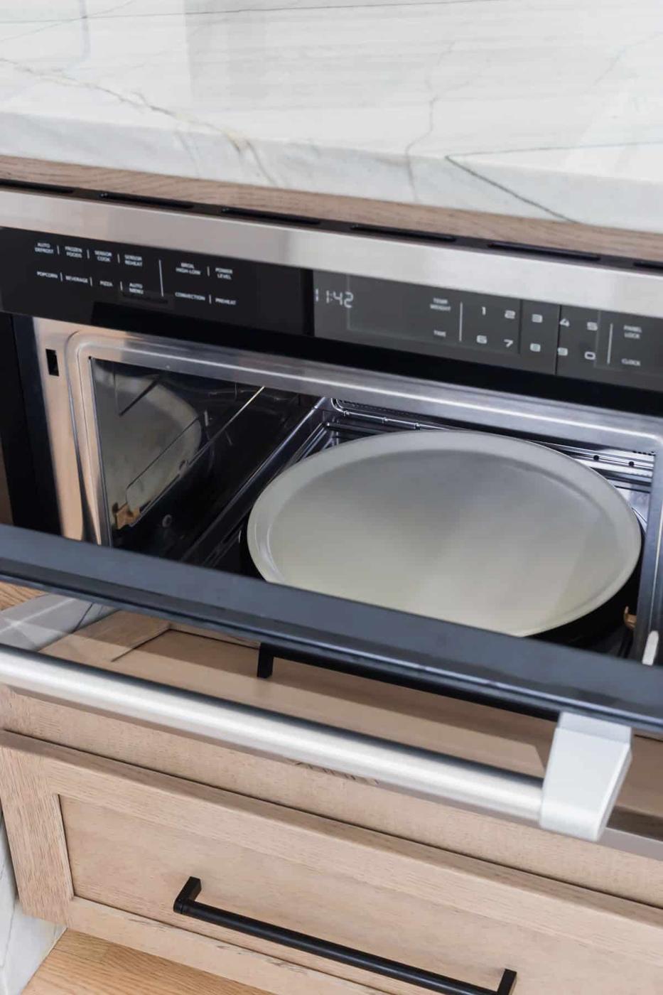 Close up of the control panel and inside of the ZLINE built-in convection microwave oven.