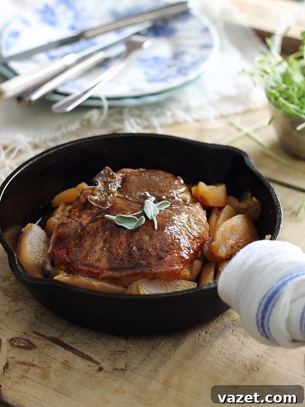 Pumpkin tea glazed pork chops and apples, a perfect fall meal.