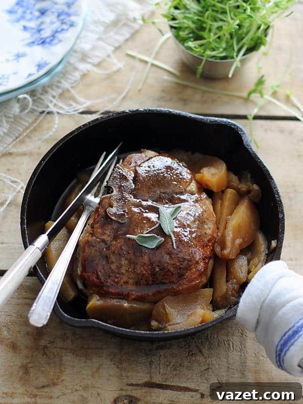 Sweet pumpkin tea glazed pork chops and apples, a hearty and healthy dish.