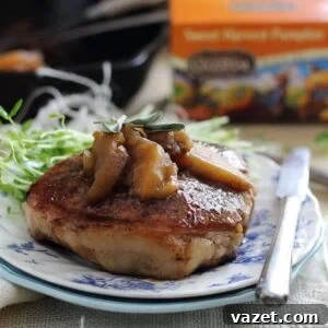 Glazed pork chops and apples ready to be served.
