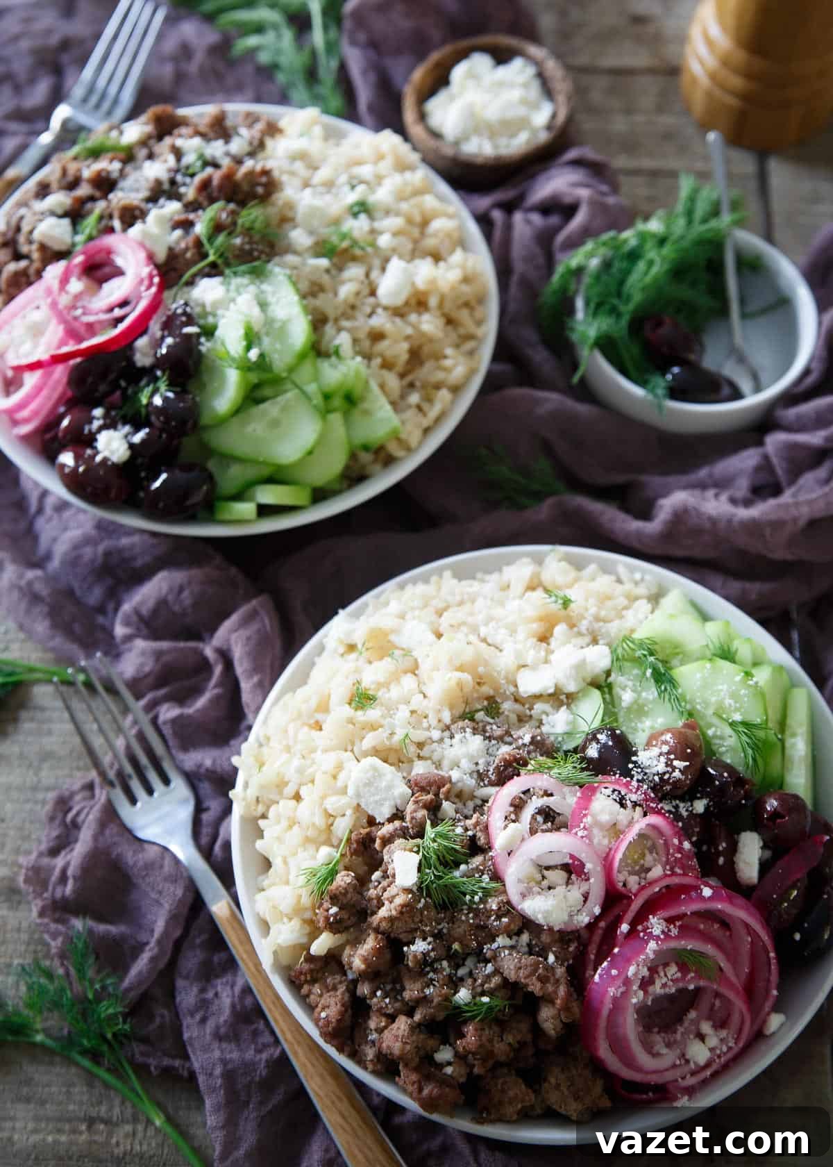 Ultimate Greek Brown Rice Bowls: A Healthy & Flavorful Meal Prep Essential Flavorful Greek Brown Rice Bowls with seasoned lamb, pickled red onions, cucumbers, olives, and feta cheese
