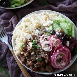 Vibrant Greek Brown Rice Bowls 2 Greek Brown Rice Bowls with a variety of fresh ingredients for a healthy and balanced meal