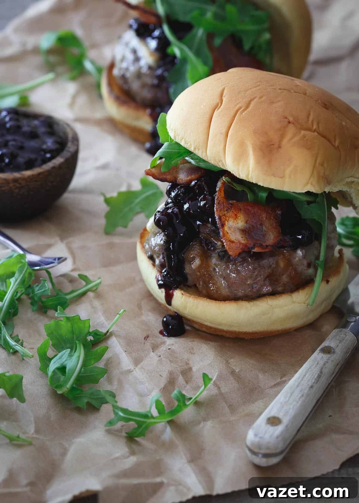 This brie burger is topped with a sweet and tangy blueberry BBQ sauce, crispy bacon and fresh arugula. This brie burger is topped with a sweet and tangy blueberry BBQ sauce, crispy bacon and fresh arugula.
