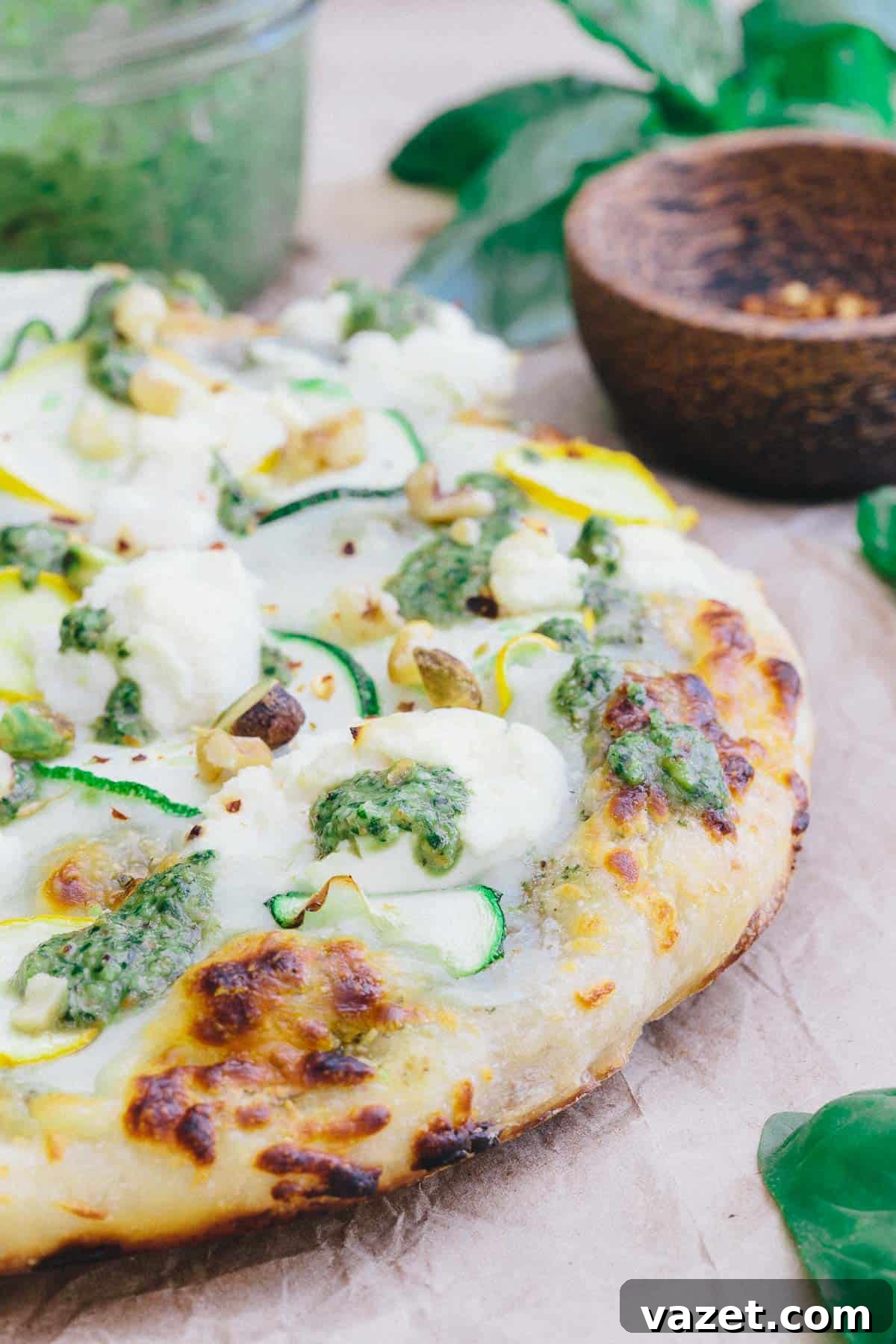 Skillet Zucchini Pesto Pizza is a burst of summer ingredients with eachC bite. Skillet Zucchini Pesto Pizza is a burst of summer ingredients with each bite.