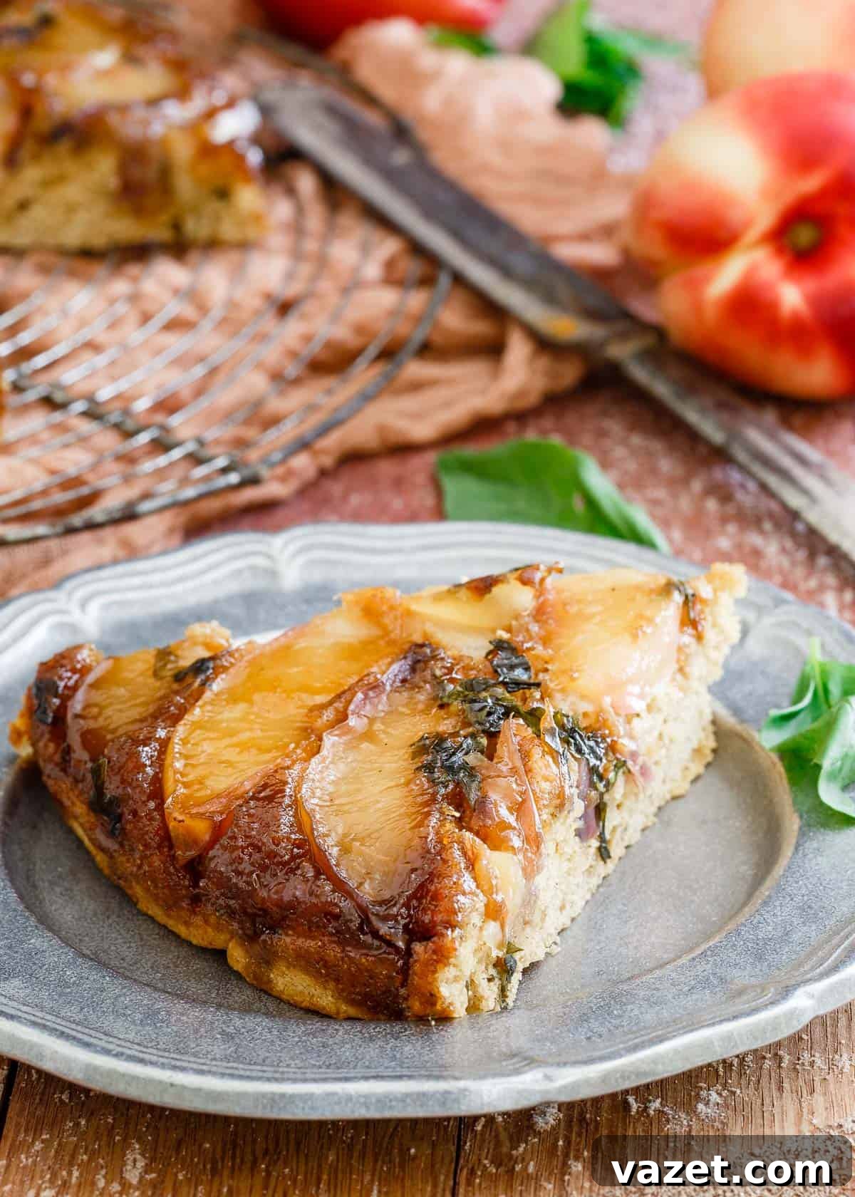 Fresh basil leaves garnish this delicious gluten-free basil nectarine upside-down cake, a perfect summer treat.