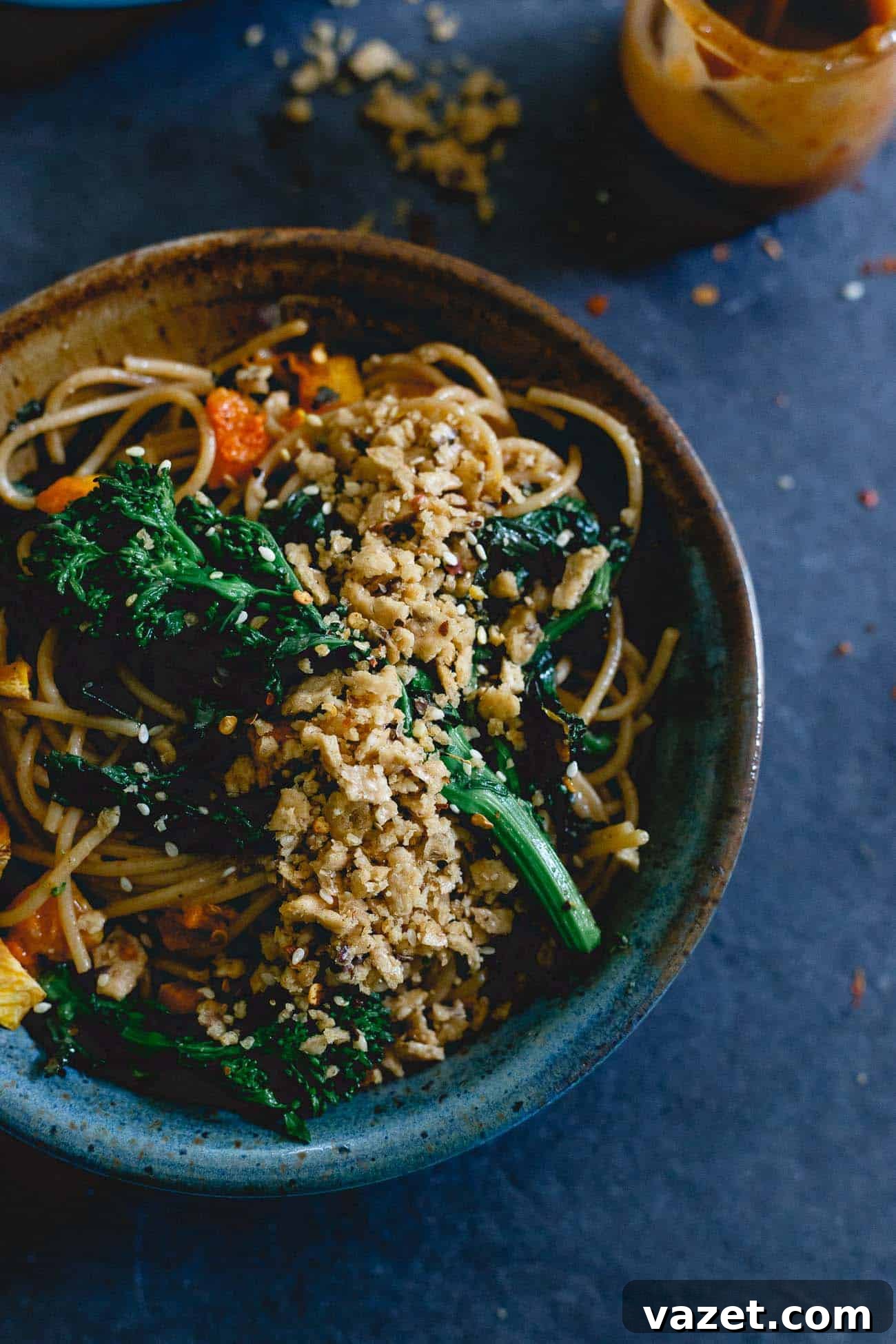 Hearty Fall Pasta: Roasted Butternut Squash & Broccoli Rabe with Creamy Almond Butter Sauce This fall pasta is filled with roasted butternut squash and broccoli rabe, tossed in a creamy almond butter sauce and topped with a buttery garlic cracker crumble. A perfect seasonal dinner idea.