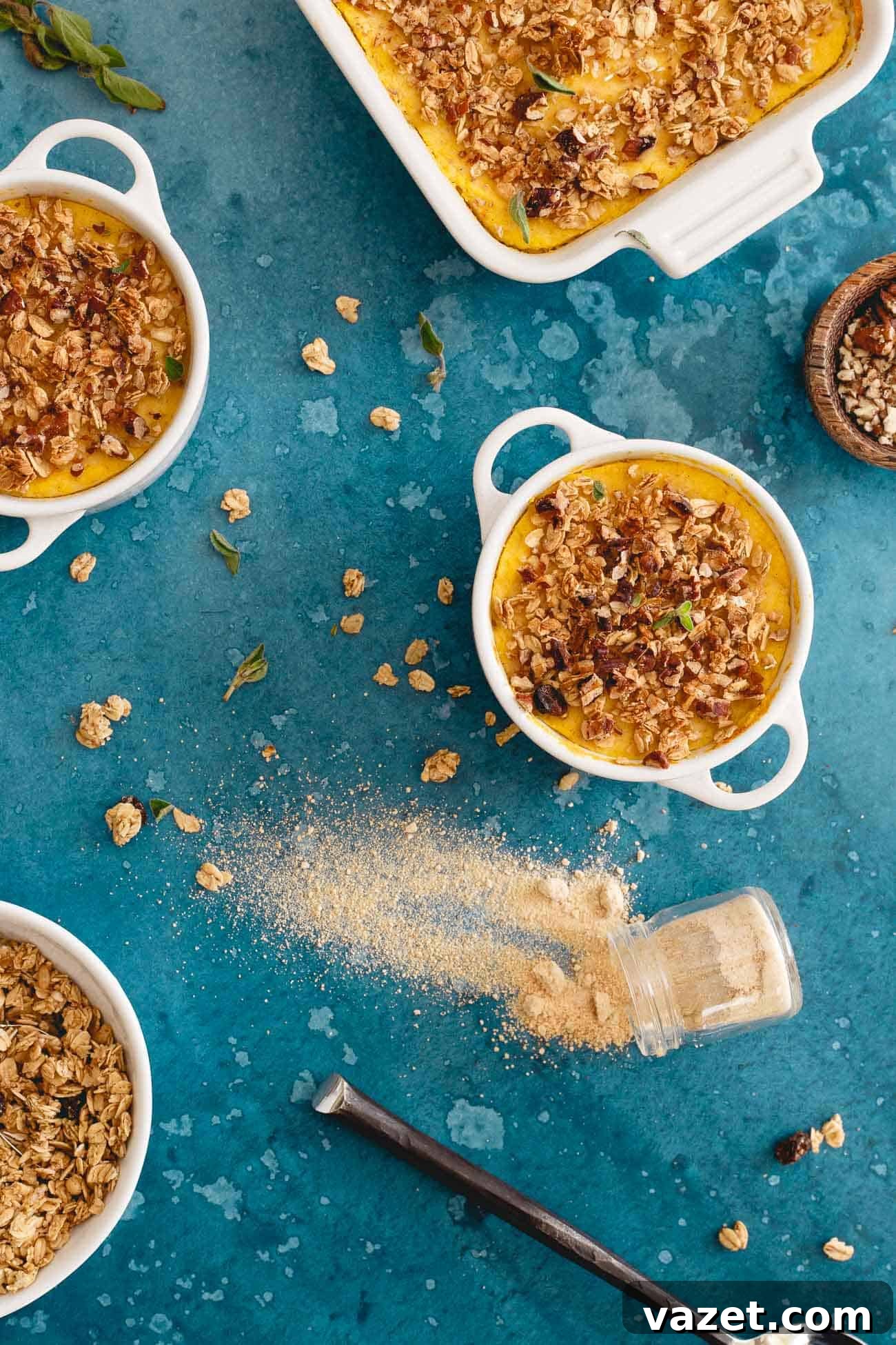 This cauliflower pumpkin mash is made with creamy marscapone and topped with vanilla granola and pecans. A healthier alternative to sweet potato casserole! This cauliflower pumpkin mash is made with creamy marscapone and topped with vanilla granola and pecans. A healthier alternative to sweet potato casserole!